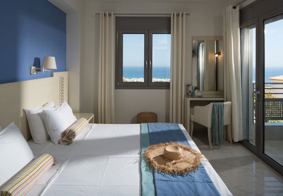 Danae Villas Hersonissos Crete Yellow Villa twin bedroom with balcony view