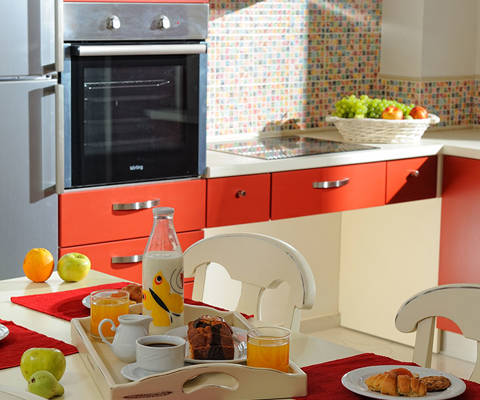 Danae Villas Hersonissos Crete Red Villa kitchen table full of breakfast