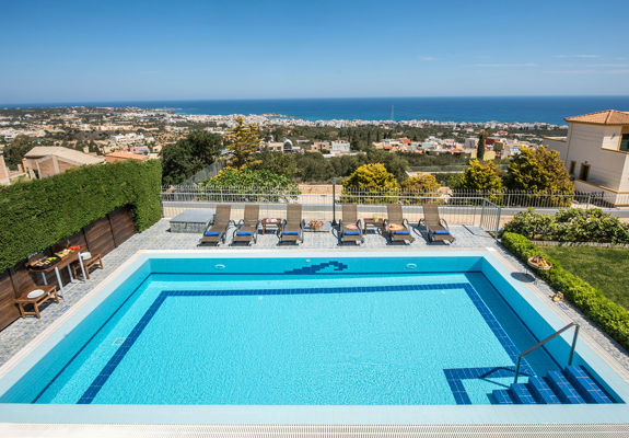 Danae Villas Hersonissos Crete Yellow Villa pool and sunbeds and great view in the background