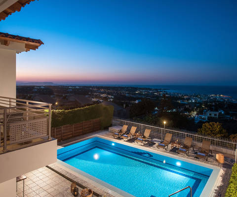 Danae Villas Hersonissos Crete Yellow Villa pool, sunbeds and great view at dusk