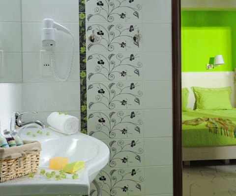 Danae Villas Hersonissos Crete Green Villa bathroom washbasin, amenities and view of the room
