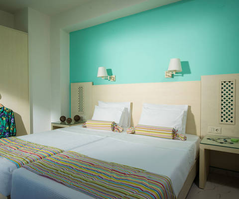 Danae Villas Hersonissos Crete Red Villa twin bedroom with teal wall