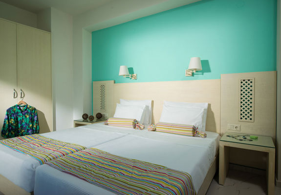 Danae Villas Hersonissos Crete Red Villa twin bedroom with teal wall