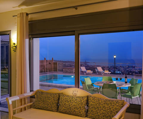 Danae Villas Hersonissos Crete Green Villa living room and view of the pool