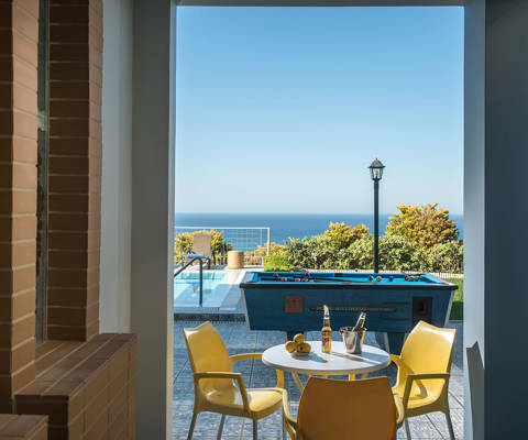 Danae Villas Hersonissos Crete Yellow Villa poolside table and billiard table